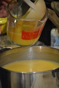 spoon some of the liquid into a large measuring cup_small