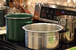 all of our pots boiling on the stove top_small