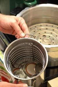 boil the jar lids in a pot on the stove to sterilize_small