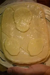 20 apply skulls to top of coffin_small