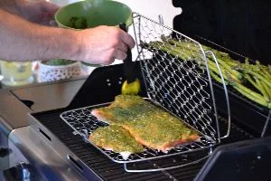 Gordon adding the pesto to the salmon_small